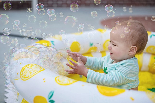 child-plays-with-bubbles-7388045_640